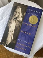 Photo of the hardcover book 'Shadow Maker: The Life of Gwendolyn MacEwen' by Rosemary Sullivan showing the front cover with author's portrait and title details.