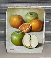 Front view of the oil painting showing the still life of oranges and apples with water droplets, signed by the artist Macall.