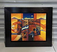 Frontal view of the framed abstract painting showing the overall composition and signature.