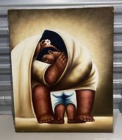 Front view of the vintage canvas painting showing mother and child.