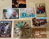 Front view of seven Indigenous Peoples postcards and associated art tile and copper postcard, showing various Native American imagery.