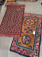 Both rugs laid side by side on floor showing full design and relative size
