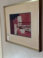 Framed artwork full view showing mat, frame and composition