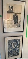 Overview of two framed black-and-white woodcut prints mounted side by side