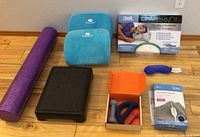 Overview of therapy and comfort items including foam roller, back cushions, weights, heating pad, footrest, eye mask, and CPAP pillow box.
