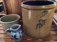 Full view of the three stoneware pieces displayed together