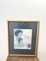 Full view of framed Brenda Joysmith vintage art print depicting a mother and two children.