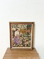 Full view of the vintage framed cross stitch picture "Summer" showing a woman and children in a floral garden scene.