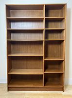 Front view of teak veneer two-column bookcase