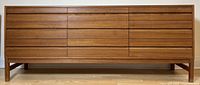 Full front view of teak dresser