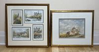 Two framed watercolours side by side: one is a collage of 4 smaller paintings in one gold frame, the other is a single painting of a windmill in a gold frame.