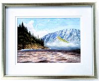 Framed watercolour painting showing lake, trees, and mountains with artist signature and date visible in lower right corner.