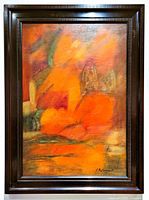 Full view of framed abstract painting featuring vibrant orange tones and textured surface.