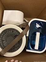 Top view showing the air purifier's circular vent and power button and the humidifier's water tank and knob.