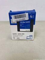 Front of the WD Blue SA510 box showing 4TB capacity and SATA SSD branding.
