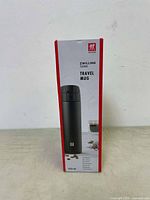 Front side of the boxed Zwilling Thermo travel mug showing product image and capacity