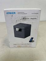 Front packaging of the sealed Anker 3-in-1 Cube charger showing product image and Apple Watch, MagSafe compatibility logos.