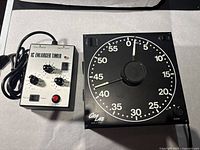 Photo of IC Enlarger Timer with power cord and controls visible, showing condition and details of buttons and knobs.
