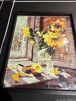 Framed paint by numbers style painting depicting vibrant sunflowers in a glass vase on a table near a window, with an apple and lemon as additional still life elements.