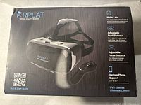 Original box of Riplat VR glasses featuring product image and key features including adjustable pupil distance, focus distance, wider lenses, and phone compatibility.