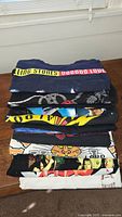 Stack of folded T-shirts showing full lot