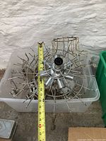 Metal chandelier frame with multiple wire hooks, approx. 15 inches diameter