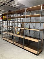 Front view of four assembled shelving sections