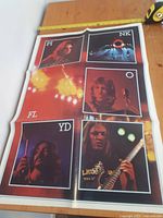 Poster showing portraits of Pink Floyd band members with the band's name text arranged across photos.