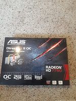 Box of ASUS Radeon HD 7790 GPU showing front design and branding.