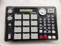 Top view showing control pad bank, knobs, buttons, LCD screen labeled MPC500