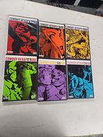 Front covers of all six Cowboy Bebop DVDs showing colorful character artwork.