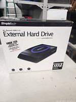 Front of the retail box showing product branding, capacity (500GB), and USB 2.0 interface.