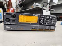 Front panel powered on with display showing preset details