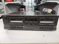 Front view of Technics RS-TR535 double cassette deck showing full front panel with cassette compartments, buttons, and controls.