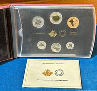 Photo of the complete 2016 Royal Canadian Mint coin specimen set inside protective casing with certificate of authenticity.