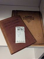 Two vintage books side by side showing title of Oxford medical publication and Albert Hubbard scrapbook.