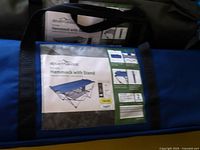 Blue Ridge branded carrying bag for hammock with stand showing product info and image on label.