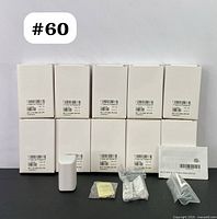 Lot of 10 unopened boxes of Visonic MCT-370 SMA sensors, showing the back labels and accessories including mounting kits and instructions.