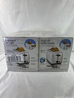 Photo of the front and side of the Hamilton Beach toaster box showing extra wide slots, high-lift toast boost, and crumb tray features.