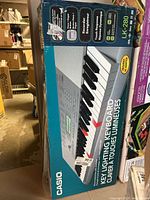 Original retail box showing front angle with keyboard graphic and model number.