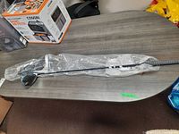 Full-length view of club on table inside plastic bag