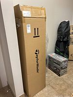 Factory shipping box with TaylorMade logo