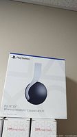 Front of Pulse 3D Wireless Headset sealed box showing PlayStation logo and model name