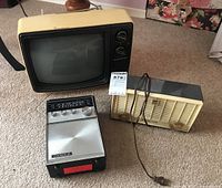 Magnasonic MBT-123 TV alongside Fleetwood Model 5061 radio and a Candle radio showing overall condition and relative size