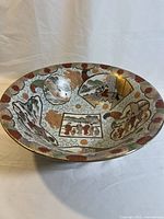 Full view of vintage Andrea by Sadek Satsuma bowl showing interior design with Geisha scenes, floral and Imari gold patterns.