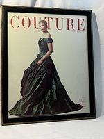 Full view of framed Couture December 1959 magazine cover print showing model in a dark glossy gown and black frame.