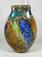 Full view of the vintage hand blown glass vase showing overall shape and color pattern.