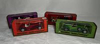 Set of 4 Matchbox Models of Yesteryear cars in original boxes, showing red, green, purple, and brown box colors and visible wear on boxes
