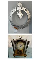 Front view of the large gear wall clock mounted on wall with visible numbers 1 to 12 and multiple silver gears.