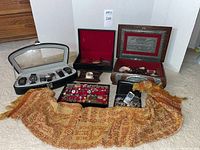 Wide view of entire lot showing boxes, watch case, trays, scarf